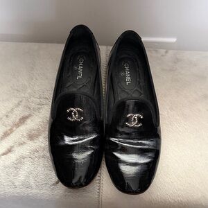 CHANEL Glossy Black Loafers with Logo Accent